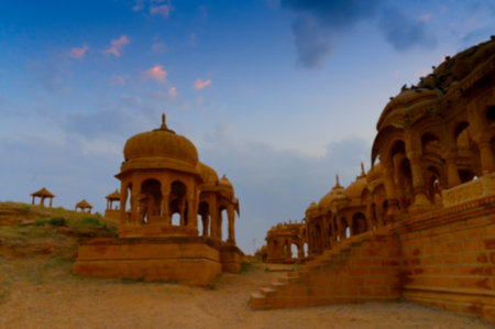 Blurred image of Bada Bagh or Barabagh, means Big Garden, is a garden complex in Jaisalmer, Rajasthan, India, for Royal cenotaphs, or chhatris, of Maharajas means Kings of Jaisalmer state.の写真素材
