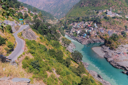 Alakananda river with turquoise blue colour from right side converge at Devprayag and form river Ganges thereafter.Garhwal, Uttarakhand, India.の写真素材