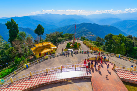 Beautiful front side view of Samdruptse Monastery with Himalayan mountains in the background. Samdruptse is a huge buddhist memorial statue in Sikkim, India.の写真素材