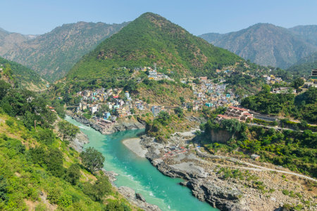 Devprayag, Godly Confluence,Garhwal,Uttarakhand, India. Here Alaknanda meets the Bhagirathi river and both rivers thereafter flow on as the Holy Ganges river or Ganga. Sacred place for Hindu devotees.の写真素材