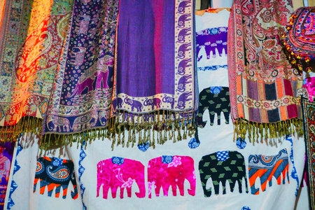 Beautiful colorful Indian sarees are displayed for sale at market place, Jaisalmer, India.の写真素材
