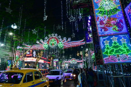 Kolkata, West Bengal, India - 24.12.2023 : Festive Christmas lighting at Park street. Decorated lighting illuminating busy Park street at night. Citizens visit Park street to enjoy festive mood.のeditorial素材