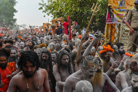 Haridwar, Uttarakhand, India - 13th April 2021 : Purno Kumbhmela event.Hindu naked sadhus, naga babas, naga sanyasis running for having shahi snaan on river Ganges and shouting Har Har Mahadev.のeditorial素材