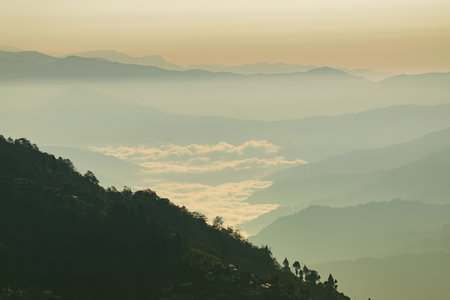 Scenic beauty of layers of mountains, Okhrey, sikkim, India. Okhrey village of one of the remotest places in Sikkim where peaceful, tranquil Himalayan mountain range is enjoyed by tourists from India.の写真素材