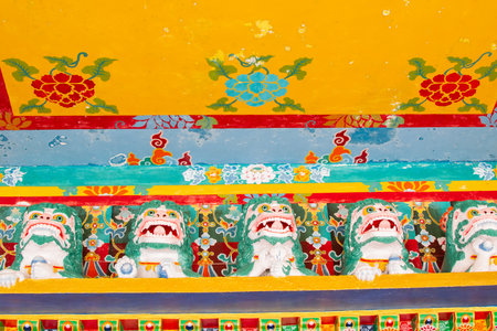 Colourful Buddhist Mural, interior decoration of Buddhist monastery in Ralong, Ralong Monastery, Sikkim, India. Image shot with permission.の写真素材
