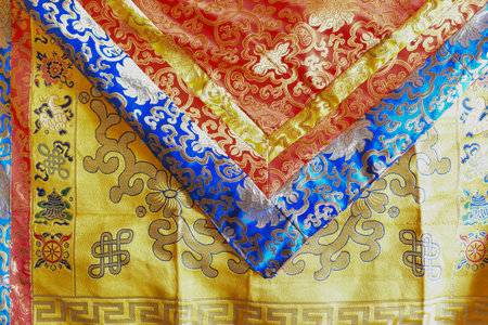 Tibetan Buddhist silk brocade cloth, altar cloth or shrine cover at Rinchen Chholing Monastery. Rinchenpong, Sikkim, India.の写真素材