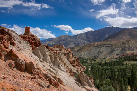 Ruins and Basgo Monastery surrounded with stones and rocks , Leh, Ladakh, Jammu and Kashmir, India. Blue sky background.の写真素材