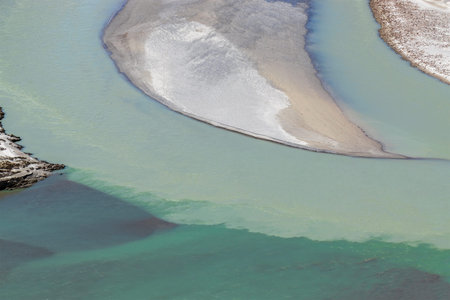 River water flowing at confluence of the Indus and Zanskar Rivers, known as Sangam, is located near...