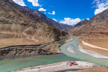 Scenic beauty of the confluence of the Indus and Zanskar Rivers, known as Sangam, is located near...