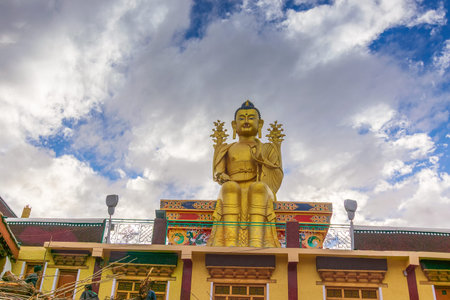 Huge statue of Buddha and blue sky at Likir Monastery or Likir Gompa,Klud-kyil, a Buddhist monastery in Ladakh, Northern India. Gelugpa sect of Tibetan Buddhism and was established Lama Duwang Chosje.の写真素材