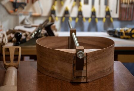 an anatolian / mediterranean lavta musical instrument being build in workshopの写真素材