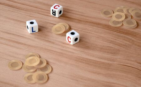 some rare, little known game / gamble being played scene with extraordinary dices and money chipsの写真素材
