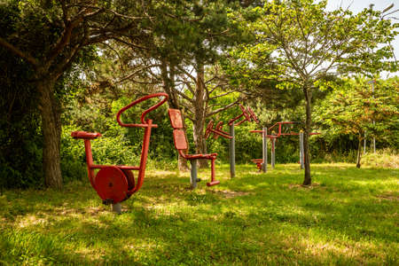 public sports equipment in a magnificent green natural park, totally empty. public gym center, outdoor.の写真素材