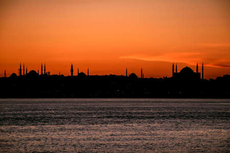 absolute silhouette of the istanbul city with biggest mosques, red sky, sunset.の写真素材