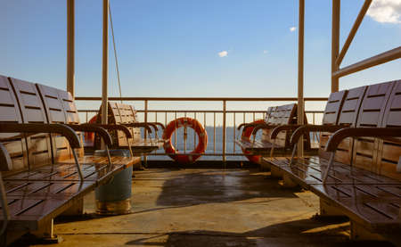 empty seats on ferry terrace, wide angle close-up shot.の写真素材