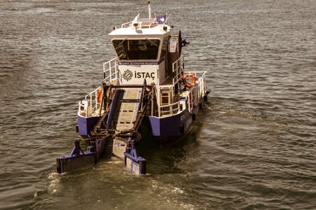 Istanbul/Turkey - July, 2020: a sea surface cleaning boat working on the Bosphorus, environmental protection policies.のeditorial素材