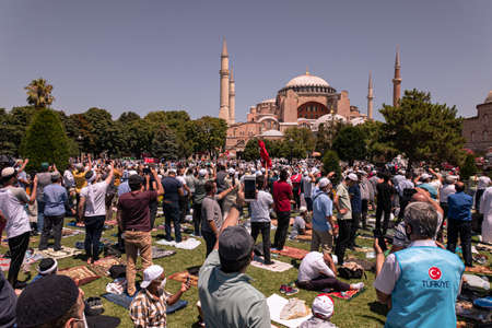 Istanbul/Turkey - July 24, 2020: Opening of the Hagia Sophia church / museum as a mosque and the first 'Friday' pray with the president of Turkey. People pray on the street in Ayasofya square, outdoorのeditorial素材