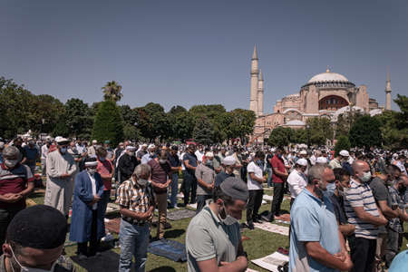 Istanbul/Turkey - July 24, 2020: Opening of the Hagia Sophia church / museum as a mosque and the first 'Friday' pray with the president of Turkey. People pray on the street in Ayasofya square, outdoorのeditorial素材