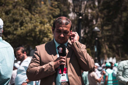 Istanbul/Turkey - July 24, 2020: Opening of the Hagia Sophia church / museum as a mosque and the first 'Friday' pray. An announcer on the government's channel is passing live newsのeditorial素材