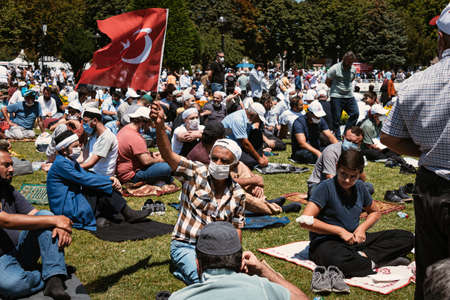 Istanbul/Turkey - July 24, 2020: Opening of the Hagia Sophia church / museum as a mosque and the first 'Friday' pray. People are waiting for first pray, and politically supporting president Erdogan.のeditorial素材