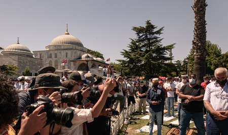 Istanbul/Turkey - July 24, 2020: Opening of the Hagia Sophia church / museum as a mosque and the first 'Friday' pray. Members of the press view people who pray outside.のeditorial素材