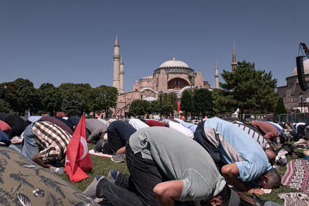 Istanbul/Turkey - July 24, 2020: Opening of the Hagia Sophia church / museum as a mosque and the first 'Friday' pray with the president of Turkey. People pray on the street in Ayasofya square, outdoorのeditorial素材