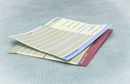 sample receipts of sending and receiving money, money transfer. closeup.の写真素材