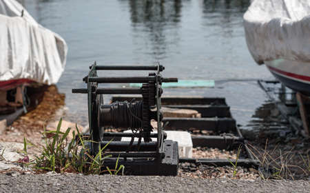 wire rope pulley used to pull boats to shoreの写真素材