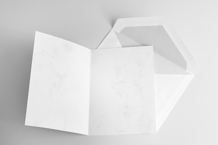 Blank open card and envelopeの写真素材