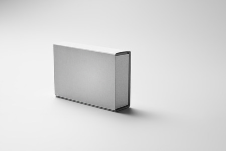 Blank box over gray wall の写真素材