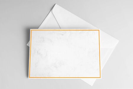 Blank Card Decorated with Yellow Frame and Envelopeの写真素材