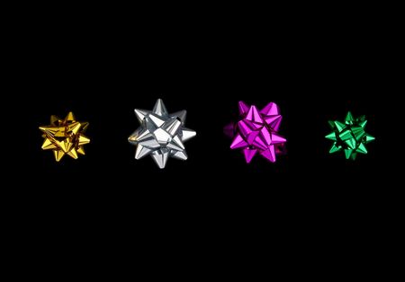 Four decoration bows on blackの写真素材