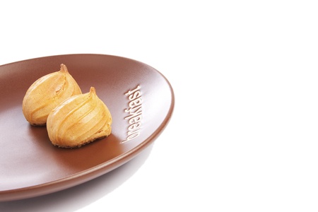 Pair of Cookies on ceramic plate with titleの写真素材