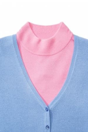 Part of blue and pink woman knitted blouses set on whiteの写真素材