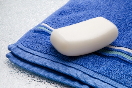 White soap bar on double towelの写真素材