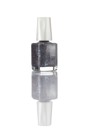 Nail polish bottle on white with reflection isolatedの写真素材