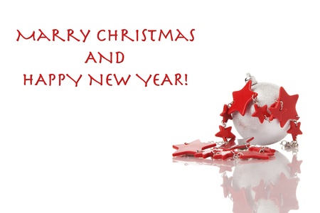 Christmas decoration red stars and silver ball on white with reflectionの写真素材