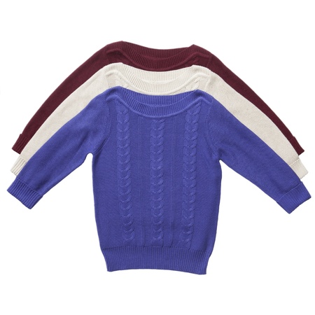 Three sweaters isolated on whiteの写真素材