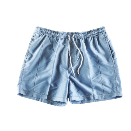 Cyan swimming shorts isolated on whiteの写真素材