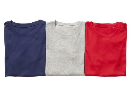 Three folded t-shirts isolated on white
