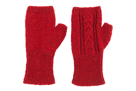Red wool mittens on white isolatedの写真素材