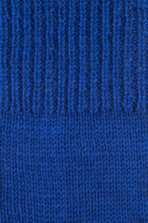 Blue wool knitted textured backgroundの写真素材