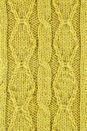 Green wool knitted textured backgroundの写真素材