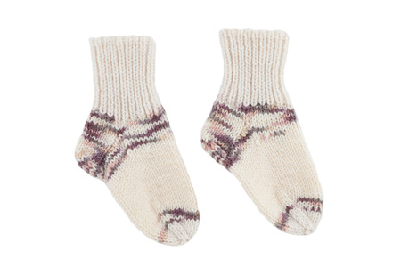 Baby wool socks isolated on whiteの写真素材