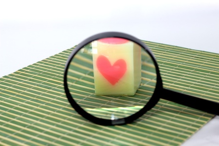 Heart-shaped candlesの写真素材