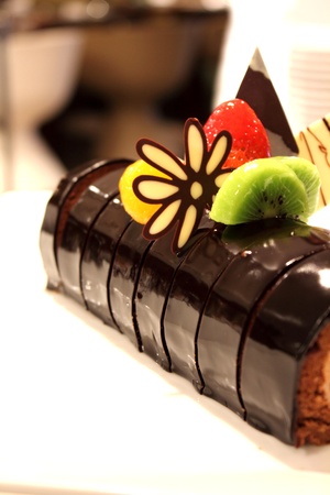  the chocolate cake roll decoration with berriesの写真素材