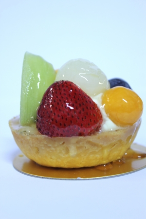 delicious mixed fruit tart kiwi strawberry bluberryの写真素材