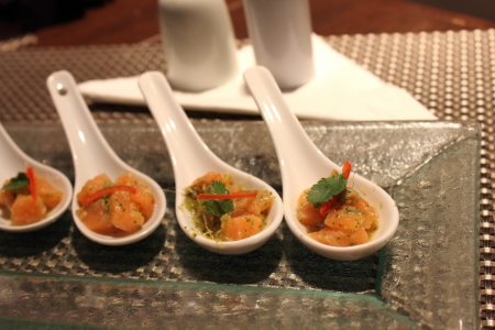 Salmon sliced ââwith seafood sauce in spoonの写真素材