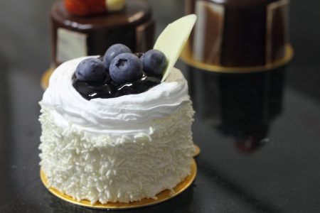 A Blueberry cake on a black background