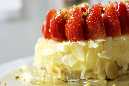 A Delicious cheese cake with strawberry toping